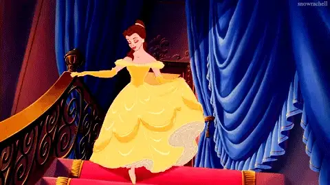 Animated princess in a yellow ball gown descending a staircase beside blue curtains