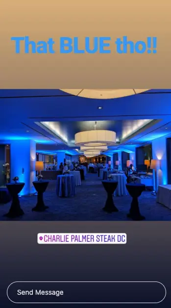Instagram story 'That BLUE tho!!' showing an event room washed in blue uplighting, tagged Charlie Palmer Steak DC