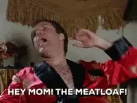 Man in a red and black satin robe with caption 'HEY MOM! THE MEATLOAF!'