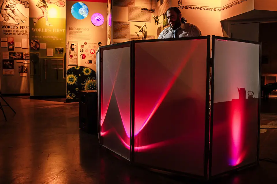 Image of a man at a DJ Booth