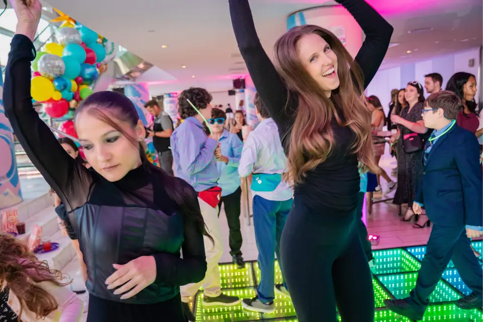 Image of girls dancing on the dance floor